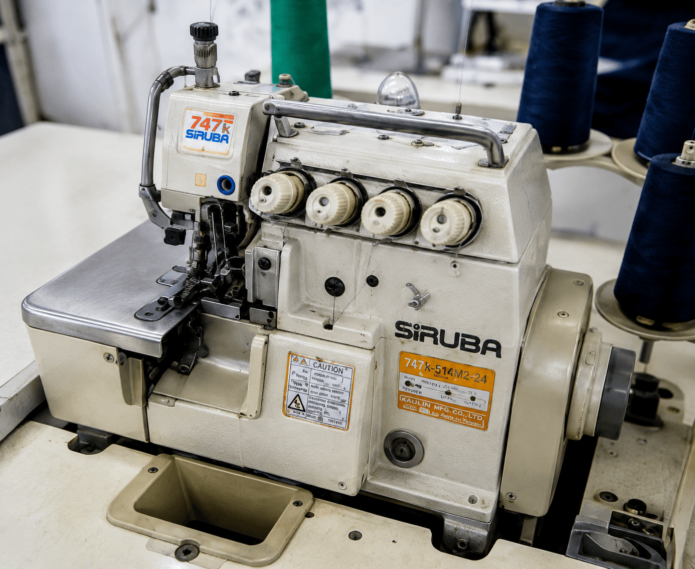 SIRUBA overlock stitching machine used for industrial workwear production